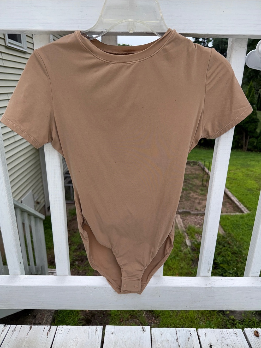 SKIMS Short-Sleeve Crewneck Bodysuit in Light Beige